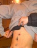 Силовики обстріляли двох чоловіків у центрі Києва (фото, відео)