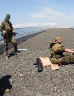 В аеропорту Донецька триває жорстке протистояння. Терористи викликали підмогу (фото, відео)